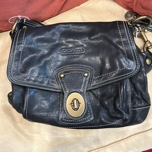 Black vintage leather  coach bag striped interior